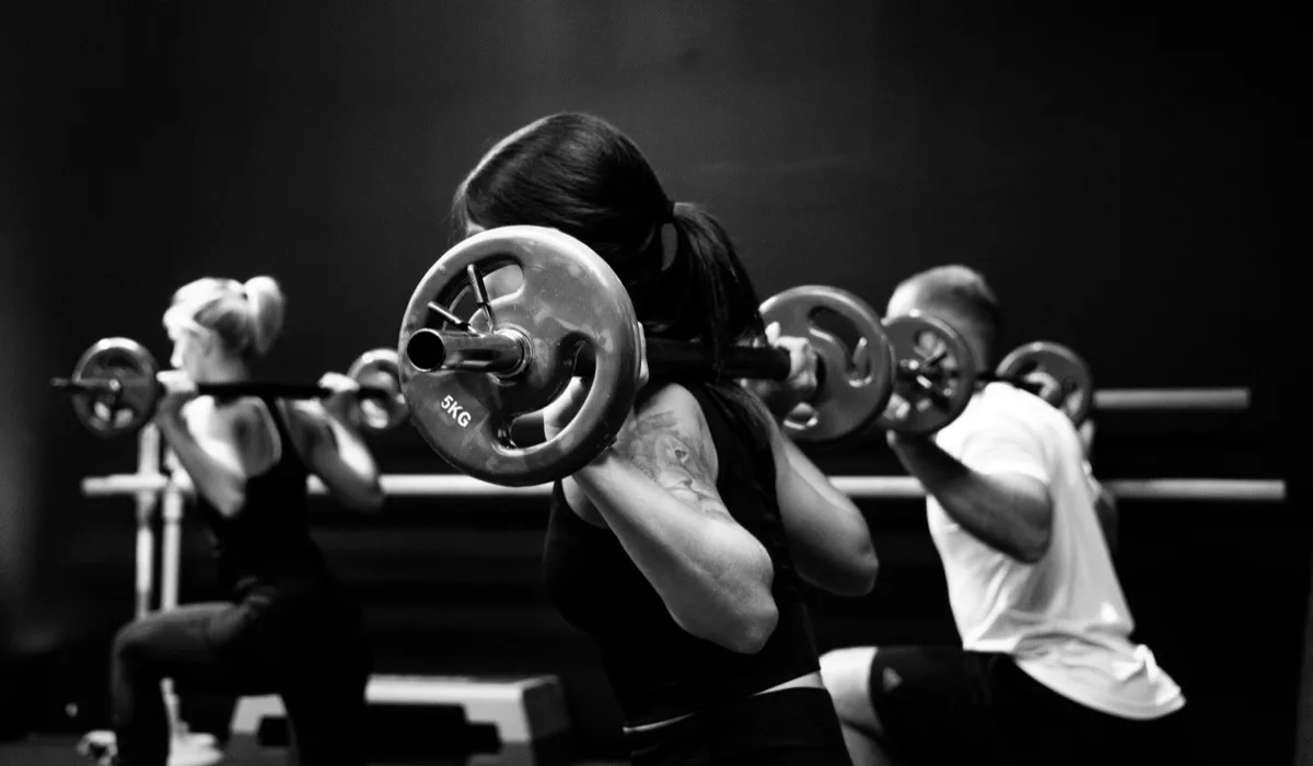Group of athletes training together in a gym